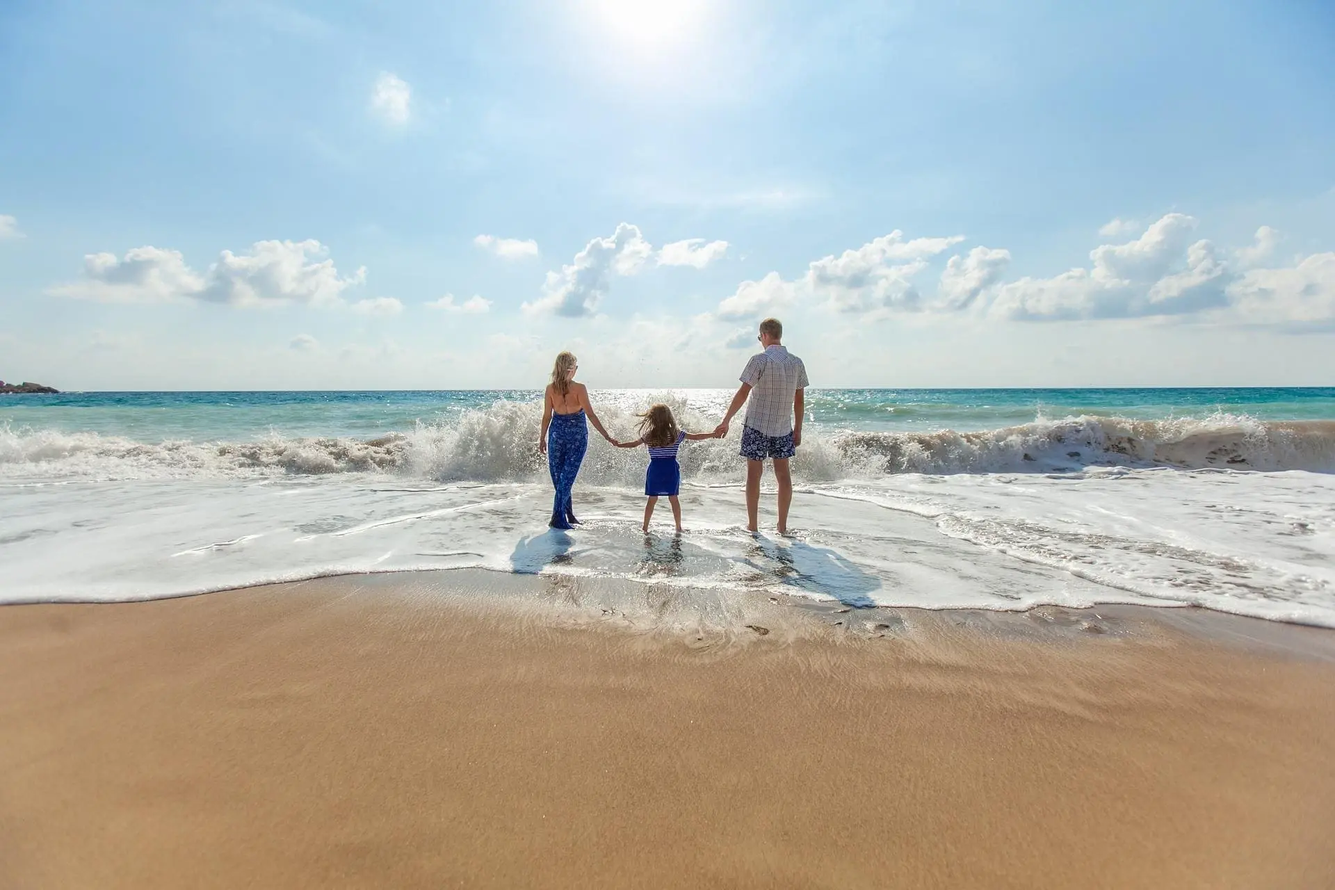 Famille au bord de la mer